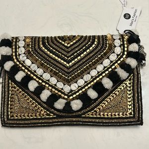 Beaded boutique clutch in gold black and white